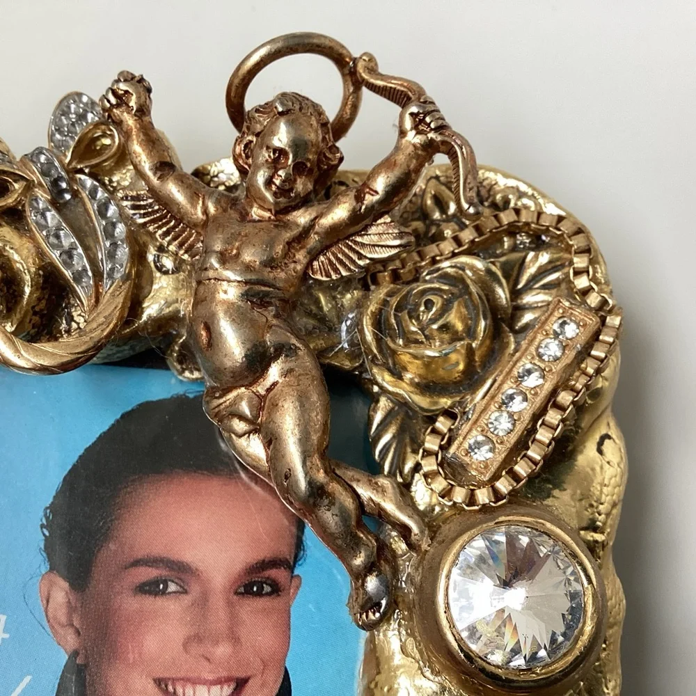 Gold spider and angel jeweled picture frame adorned with charms unique
